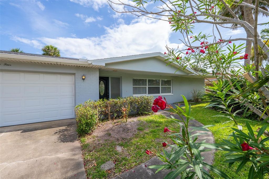 Photo of 124 June Drive, Cocoa Beach, FL 32931 (MLS # O6409431)