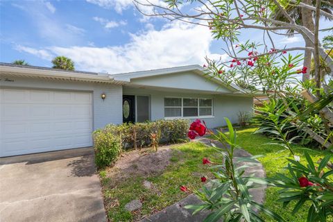 Photo of 124 June Drive, Cocoa Beach, FL 32931 (MLS # O6409431)