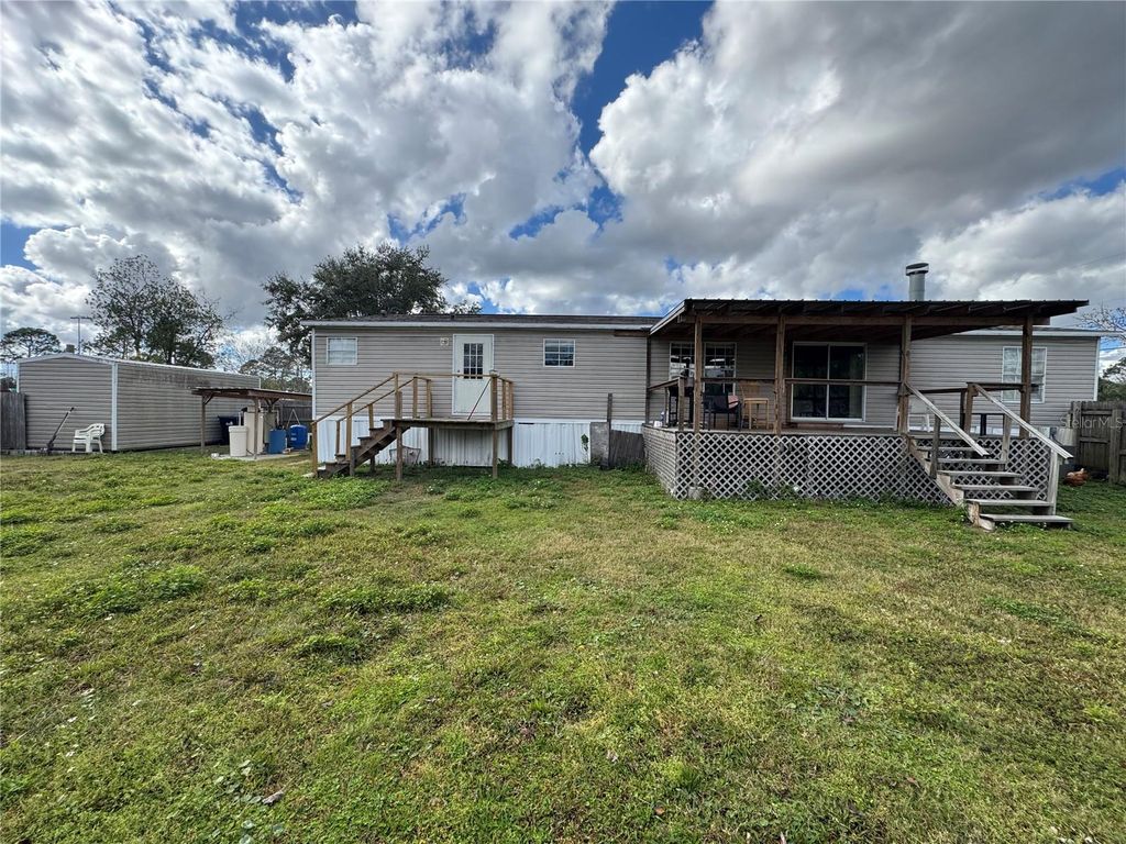 Photo of 18806 Monroe Avenue, Orlando, FL 32820 (MLS # O6372693)