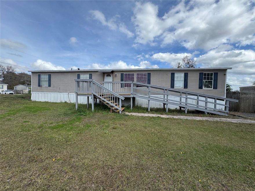 -Welcome to this beautifully remodeled 5-bedroom, 2-bath home featuring highly motivated sellers who are willing to assist buyers with closing costs. This property has been extensively updated, including a new roof installed approximately 5 months ago, a 2023 air conditioning system, and a 2024 water heater, offering peace of mind to future homeowners.

The home showcases a fully remodeled modern kitchen, along with completely renovated bathrooms and updated flooring throughout, all designed with contemporary finishes. A dedicated laundry room adds convenience, and the property also features an original and functional fireplace, enhancing both character and comfort.

Situated on a generously sized lot, the property offers ample space in both the front and rear—ideal for buyers with trucks, trailers, or those seeking additional outdoor space. The home is equipped with a private well system with chlorine and salt filtration, and the septic tank was serviced and cleaned less than 9 months ago.

Conveniently located with no HOA and no CDD, this property offers flexibility and freedom. Sellers are open to negotiations, making this an excellent opportunity.

All information is deemed reliable but should be independently verified by buyers and their agents.