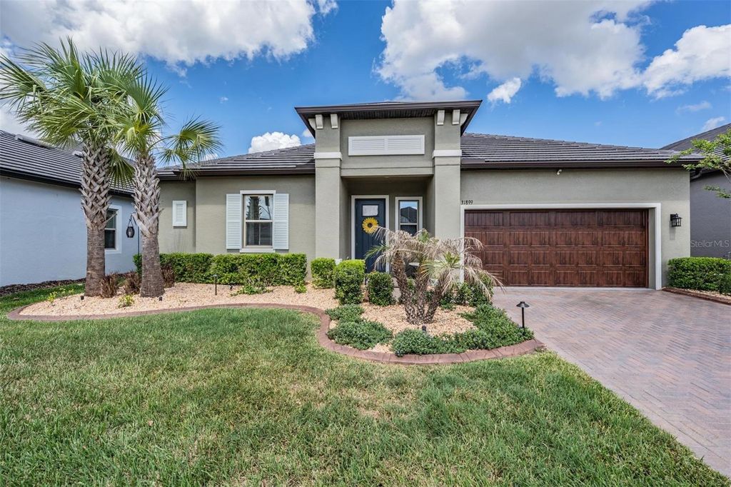 Photo of 31899 Magna Gulf Loop, San Antonio, FL 33576 (MLS # TB8493802)