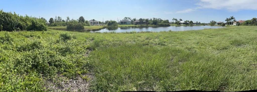 Photo of 207 Redwood Road, Rotonda West, FL 33947 (MLS # A4633248)