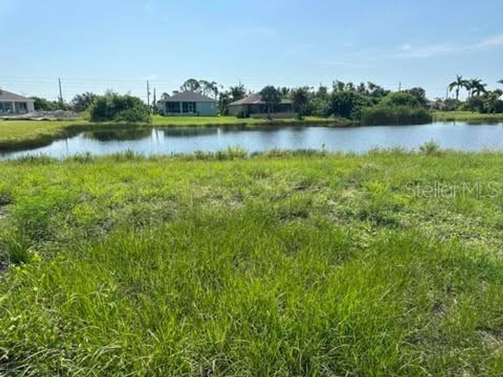 Photo of 207 Redwood Road, Rotonda West, FL 33947 (MLS # A4633248)