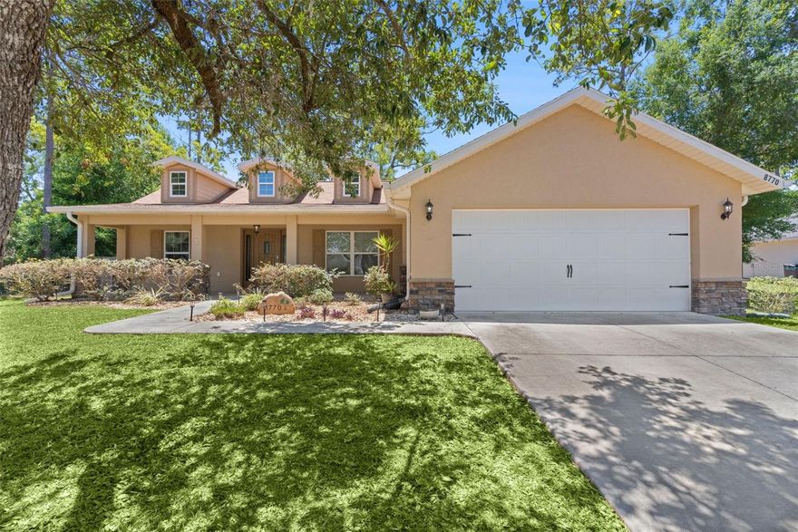 Located just north of The Villages near Mulberry Grove, this thoughtfully designed farmhouse-style home offers the perfect blend of modern finishes, functionality, and convenience. Built in 2018 by a smaller custom builder and meticulously maintained, the home features an open split-bedroom floor plan with soaring cathedral ceilings, dormer windows that fill the living space with natural light, and durable tile flooring throughout the main living areas. The kitchen was designed with both everyday living and entertaining in mind, featuring brushed level 5 granite countertops, a dedicated pantry, and a spacious dinette area overlooking the living room. A separate guest wing can be closed off with farmhouse-style sliding doors for added privacy, while the primary suite offers double tray ceilings, a large walk-in closet, and a beautifully finished walk-in shower. Recent 2026 updates include brand new bedroom carpeting and refreshed landscaping, further enhancing the home’s clean and well-kept feel. Outside, the fully fenced backyard includes an 8-foot double gate with room for boats, trailers, or additional vehicles, along with a screened rear porch and irrigation system. Additional highlights include a 2018 roof, 2018 HVAC, and easy access to shopping, dining, medical facilities, and both The Villages Charter School system and the Belleview/Ocala school districts. This is a move-in ready home in a highly convenient location with no detail overlooked.