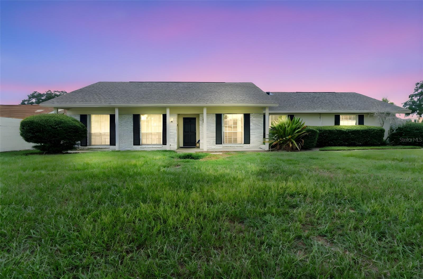 In the heart of Orlando, this four-bedroom, two-bath home blends warmth, style, and modern updates. The sleek kitchen with stainless Bosch appliances flows into bright living spaces that open to a screened-in patio and wide backyard, perfect for gatherings or quiet moments year-round. A spacious garage with workshop and EV charger, plus included washer and dryer, bring ease to daily living. Thoughtfully hand-selected furnishings by a local designer give the interiors a polished, curated look, and for the right offer, the sellers are willing to convey the home fully furnished. If you love the way it feels today, you could simply move in and begin living your Orlando story just the way it is.