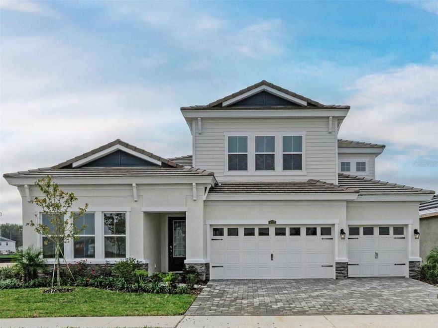 One or more photo(s) has been virtually staged. This Islamorada II is Ready Now ! This spacious residence presents five bedrooms across two thoughtfully designed stories. The main level is built for effortless living and entertaining, featuring a seamless flow connecting the grand room, island kitchen, and casual dining area. For convenience, a comfortable guest suite and full bathroom are also situated downstairs. The kitchen boasts elegant Quartz countertops and an upgraded gourmet electric appliance package that inspires culinary creativity. Outside, a generously sized lanai provides a perfect spot to unwind and take in stunning water views. The upper floor reveals an expansive bonus room, perfect for gathering or play, alongside an oversized secondary bedroom offering abundant closet space.
Listing Price amount for this Pending Sale includes Design and Structural Options.