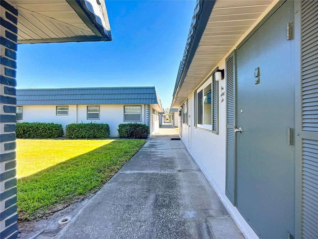 Photo of 1811 Bedford Lane #166, Sun City Center, FL 33573 (MLS # W7880568)