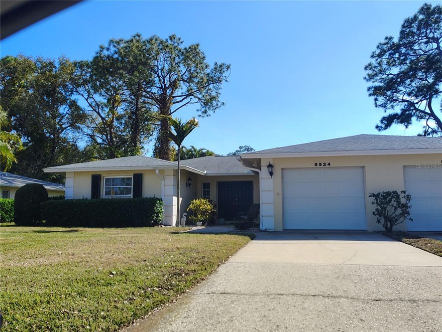 Move right into effortless Florida living with this fully furnished 3-bedroom, 2-bath villa offering 1,630 SqFt of comfortable, maintenance-free living in a prime Sarasota location. Designed for easy everyday living, the home features a bright and versatile Florida Room that adds flexible space for relaxing, entertaining, or working from home. The thoughtful layout provides both openness and privacy, making it ideal as a primary residence, seasonal retreat, or investment opportunity. Major system updates provide peace of mind, including a whole-home water filtration system (2016), hurricane shutters on all openings, and an accordion shutter for the sliders offering added storm protection and potential insurance savings. The kitchen was refreshed with new appliances (2020) complemented by updated light fixtures and new tile flooring in the owner’s suite. The garage becomes a true extension of the home with an epoxy garage floor (2022) creating a clean, finished space alongside the dedicated laundry area featuring a new washer and dryer (2022). Enjoy low-maintenance living with an HOA that covers exterior maintenance, cable TV, and pest control. The community pool is just a short distance away, and Palm Aire Country Club is minutes from your door, offering optional golf, pickleball, dining, and social memberships. Outdoor recreation and everyday convenience are close by, with Conservatory Park and Nathan Benderson Park nearby. You’re also approximately 10 minutes from Sarasota-Bradenton International Airport and The Mall at University Town Center, offering endless dining, shopping, and easy access to Sarasota’s world-famous Gulf beaches. A move-in ready villa combining comfort, thoughtful updates, and an outstanding location — designed for easy Florida living from day one.
