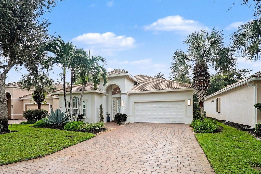 Photo of 10534 Yorkstone Drive, Bonita Springs, FL 34135 (MLS # O6445355)