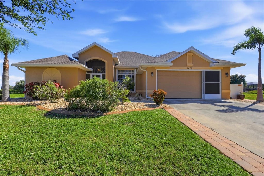 Photo of 8069 Burwell Circle, Port Charlotte, FL 33981 (MLS # D6149166)