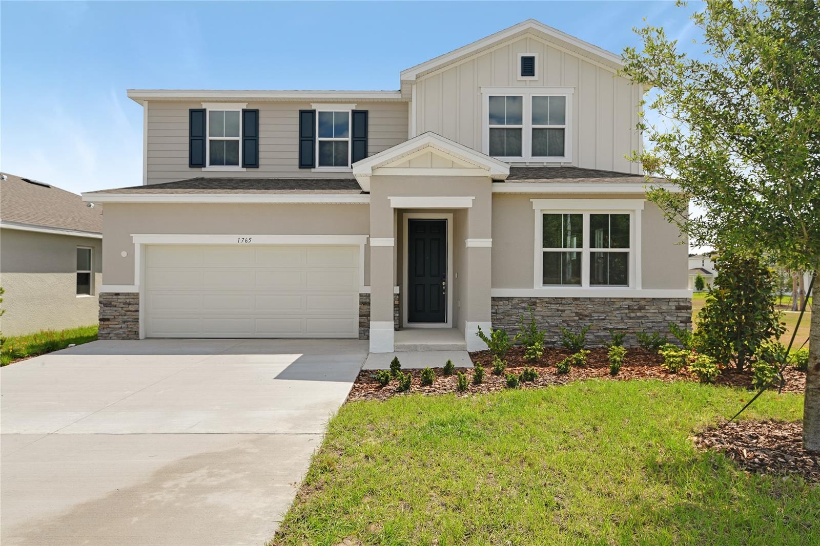 **Take advantage of special financing + Flex Funds on quick move-in homes** The Ammolite plan offers spacious living areas. On the main floor, an open layout showcases a great room, a dining area and a kitchen with a center island.A downstairs in law suite that includes private bedroom livingroom and bathroom. Upstairs, the primary suite includes a large walk-in closet and a private bath. You'll love the convenience of the second-floor laundry room. With a 2 Car Garage complete the home., Interior finishes include 42'White Kitchen cabinets/Stainless Steel Appliances/Tile Flooring in all common areas/ Quartz Countertops in kitchen and mudroom. **Options may vary by community, so see your sales associate for details. These offers are available for select homes on a first-come, first-served basis.
