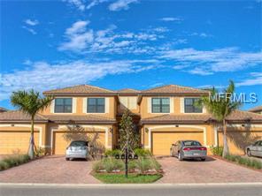 Sleek contemporary style 2nd floor coach home with tile through out living areas and carpet in bedrooms. Third bedroom is made into a nice media room for watching movies. Wonderful water and preserve views with golf course in the distance. Location of this unit is walking distance to the tennis courts and Main Club house with wonderful amenities that River Strand offers to tenants to use. This unit does come with a golf membership with a transfer fee.
