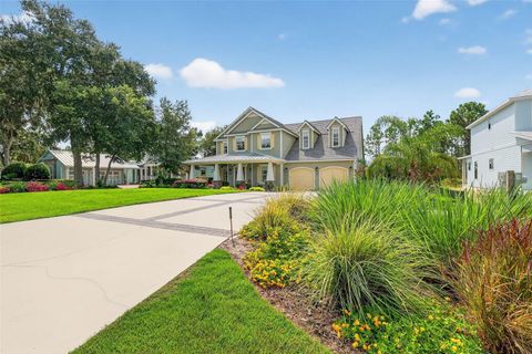 Photo of 404 Long And Winding Road, Howey In The Hills, FL 34737 (MLS # G5101795)