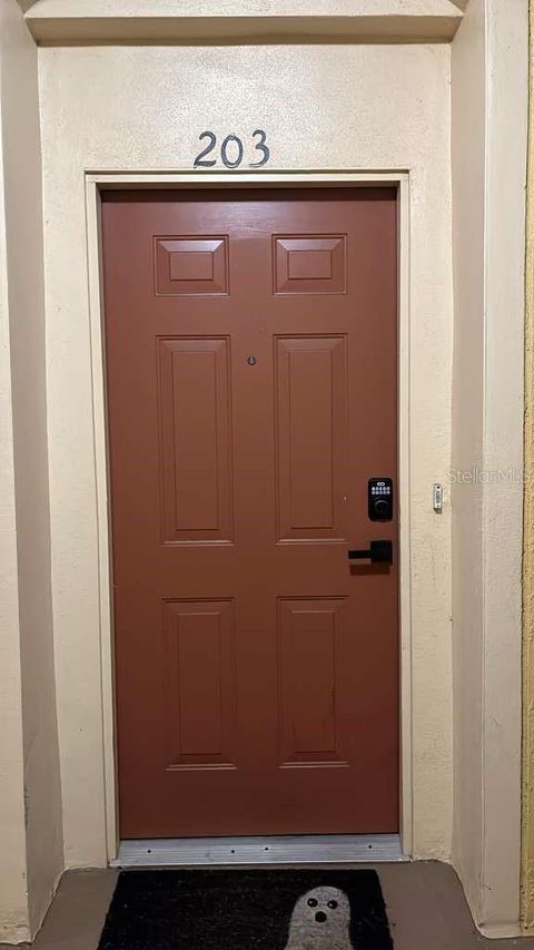 Photo of 8710 Saratoga Inlet Drive #203, Orlando, FL 32829 (MLS # S5139131)