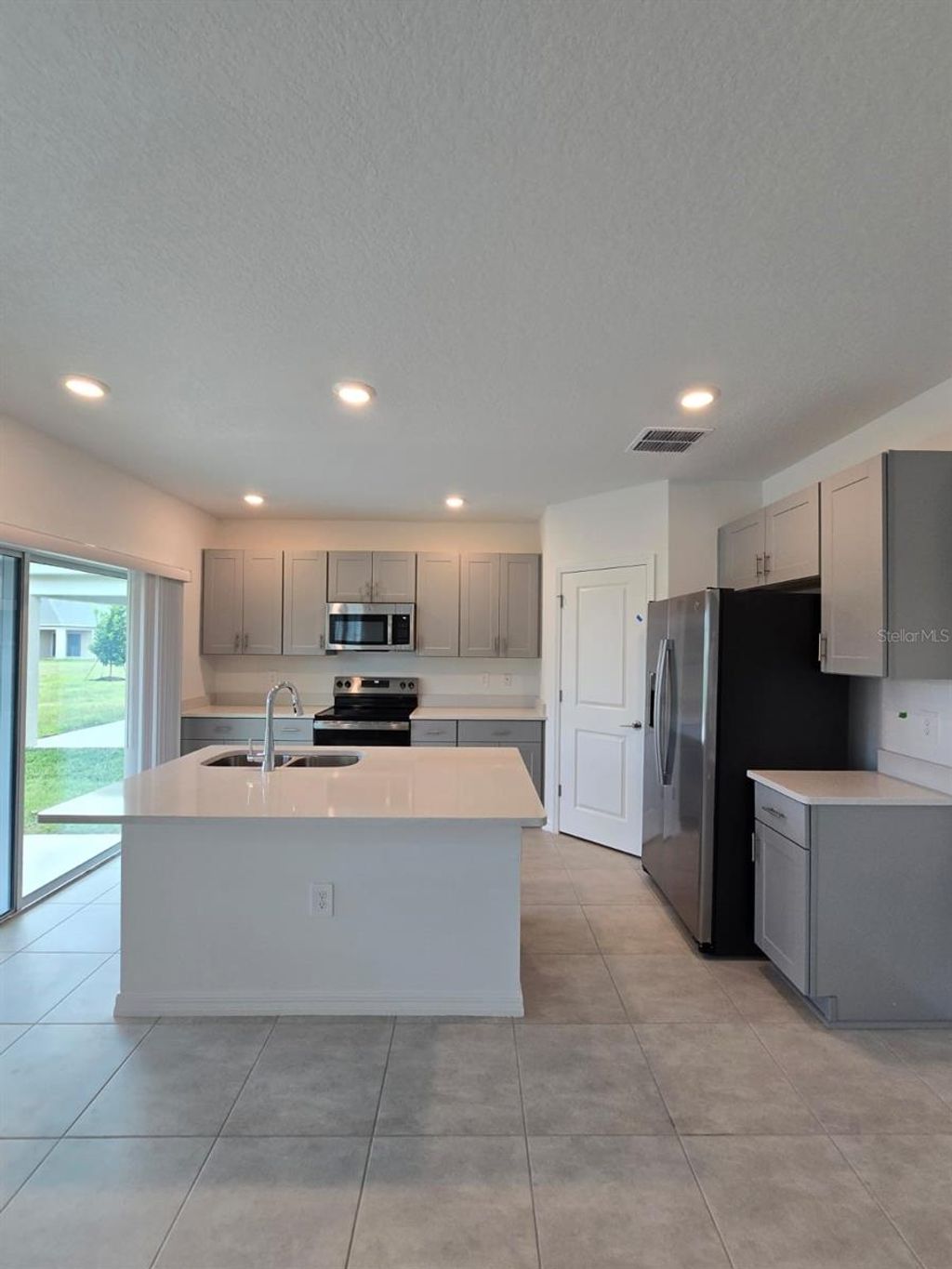 Photo of 1373 Addison Bluff Lane, Kissimmee, FL 34744 (MLS # S5139978)