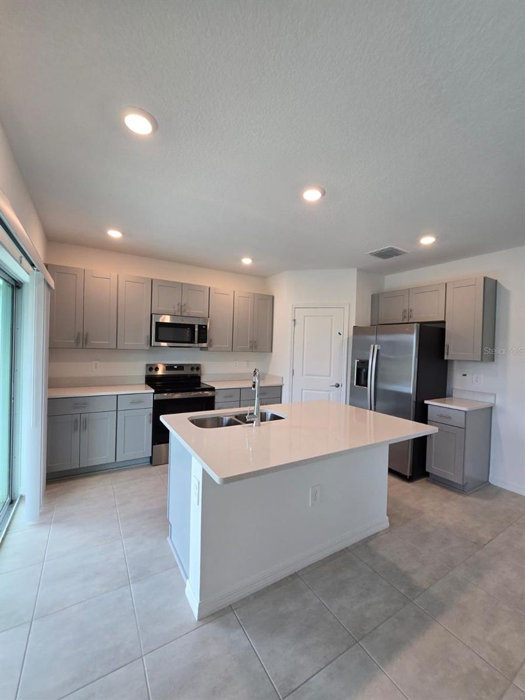 Photo of 1373 Addison Bluff Lane, Kissimmee, FL 34744 (MLS # S5139978)