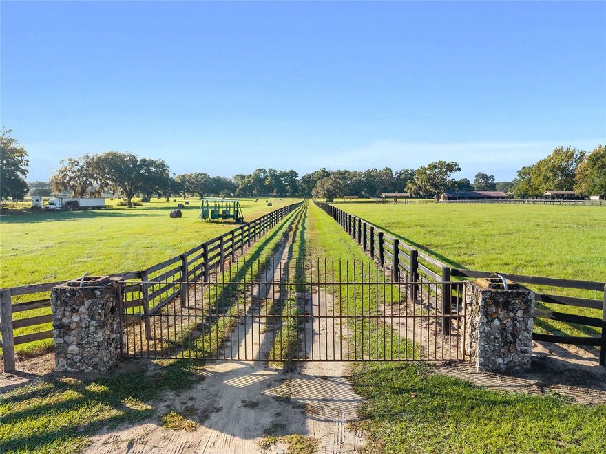 Amazing 11.88-acre property located in the desirable SW Ocala area, zoned Agricultural. This beautiful land features a spacious paddock and a well-designed barn with seven 12x12 stalls, a large feed room, and a covered area ideal for equipment or hay storage. The property is surrounded by stunning oak trees, providing natural shade and a peaceful, breezy setting for the stables. Stalls open to a turnout area for horses, offering both comfort and functionality. There is also a 3/8-mile racetrack on the property that has been allowed to grow over but can easily be restored to its former condition. Perfect location! - just minutes away, or a short horseback ride, to the Florida Greenway and minutes The Florida Horse Park and Santos Trailhead. Plus, it’s just a short 15–20-minute drive to the World Equestrian Center. This is an ideal opportunity for horse enthusiasts or anyone seeking a serene agricultural retreat in one of Ocala’s most sought-after areas.