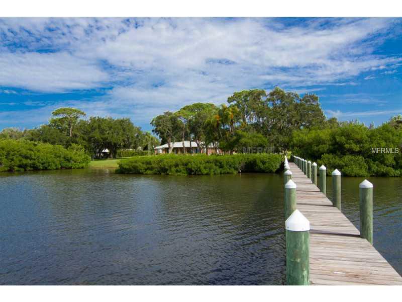 Discover the inspiring possibilities for this unique estate, beautifully set on over 12 acres on Palma Sola Bay in Northwest Bradenton. Upon approach, a glimpse of the shimmering bay emerges through a rich canopy of trees, welcoming you to your grand country escape in the city. An expansive front porch sets the perfect tone for the home's seamless blend of tradition and comfort, where time-honored standards of construction have created the framework for an incredible estate built to last. Existing designelements include exposed brick accents, wood beams, beautiful wood floors, crown molding and a charming fireplace, while breathtaking views of Palma Sola Bay can be enjoyed from almost every room. An elegant patio and impressive grounds provide the ultimate setting for the addition of a private bay front pool, with ample space for constructing a separate guest house, if you so desire. This truly special property presents endless opportunity, enveloped in privacy yet only minutes from Robinson Preserve, the city and the beautiful Gulf beaches. Total acreage includes parcels #7331315109 and #7331315159. Parcel #7331315159 includes a 3 bed/2 bath block home, built in 1978.