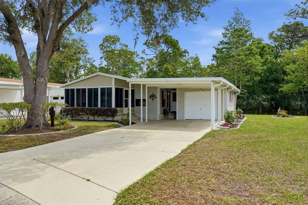 Photo of 5161 Forest Glenn Drive, Spring Hill, FL 34607 (MLS # TB8496167)