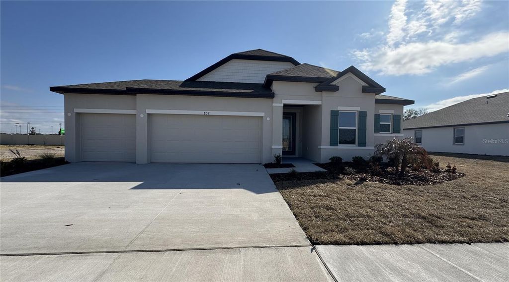 Photo of 857 Hawthorne Berry Road, Lakeland, FL 33810 (MLS # O6358254)