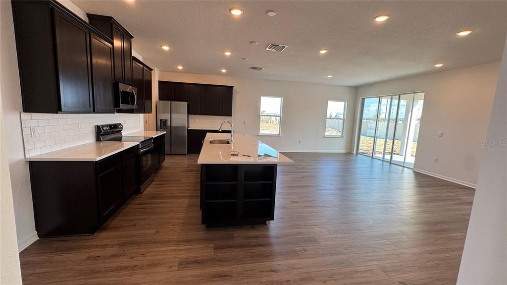 Photo of 857 Hawthorne Berry Road, Lakeland, FL 33810 (MLS # O6358254)