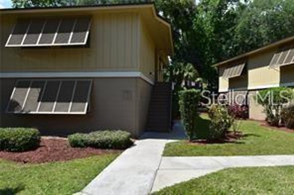 Photo of 120 Hibiscus Woods Court #7B, Deltona, FL 32725 (MLS # V4946395)