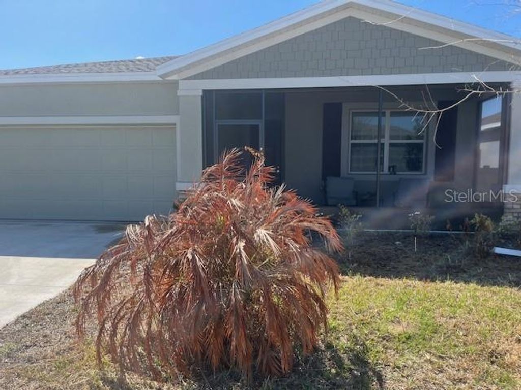 Photo of 1148 Tyler Loop, Winter Haven, FL 33884 (MLS # L4960292)