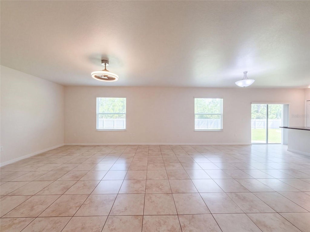 Photo of 370 Hyacinth Street, Port Charlotte, FL 33954 (MLS # O6448471)