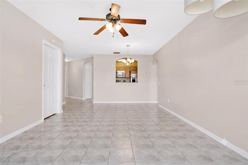 Photo of 3930 Southpointe Drive #214, Orlando, FL 32822 (MLS # O6448823)