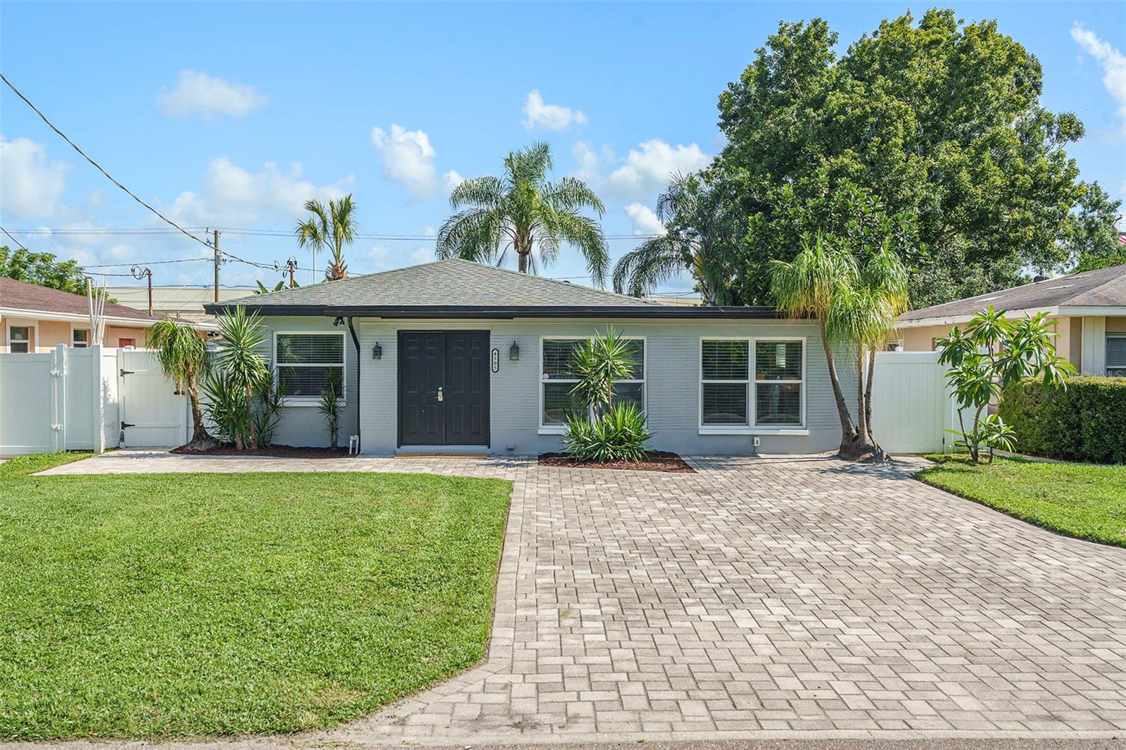 This beautifully maintained, pre-inspected pool home is ready for its new owners! Located in the desirable Bon Air North neighborhood, residents can enjoy all the conveniences of South Tampa. This home has never experienced any kind of water intrusion and it is NOT in a flood zone. Situated high and dry in Flood Zone X, flood insurance is not required here. This home was meticulously remodeled from top to bottom, nothing was left untouched. The spacious kitchen has been tastefully appointed with brand new shaker cabinets, granite counters and all new appliances. The primary suite features split vanities, two separate closets for added storage and a private exit into the fully fenced-in backyard. Step out into a tropical oasis surrounded by swaying palm trees and foliage while the pool sparkles. The 30' x 15' in-ground saltwater pool has a new heater, now offering year-round enjoyment. The added covered lanai provides shade from Florida's sun, perfect for weekend barbecues. The major components of this home have all been updated, ensuring years of maintenance-free homeownership: roof (2018), HVAC (2023), water heater (2023), electrical panels (2023), blown-in insulation (2018) and updated windows (2012). Additionally, all of the plumbing has been completely replaced inside and out, including a sewer replacement (2023) and re-piped supply lines (2024). Without an HOA or CDD, this home gives you the ultimate freedom to make it your own. Ideally located just minutes to vibrant Midtown, Downtown, Tampa International Airport, MacDill Air Force Base and top-rated Gulf beaches, this home offers the best of city convenience and neighborhood charm. Zoned for highly coveted A-rated school district including Grady Elementary, Coleman Middle, and Plant High School, the property also sits on a quiet, walkable street in a friendly community with low traffic. This home is move-in ready. Schedule your private tour today! A floorplan and four-point inspection are available upon request.
