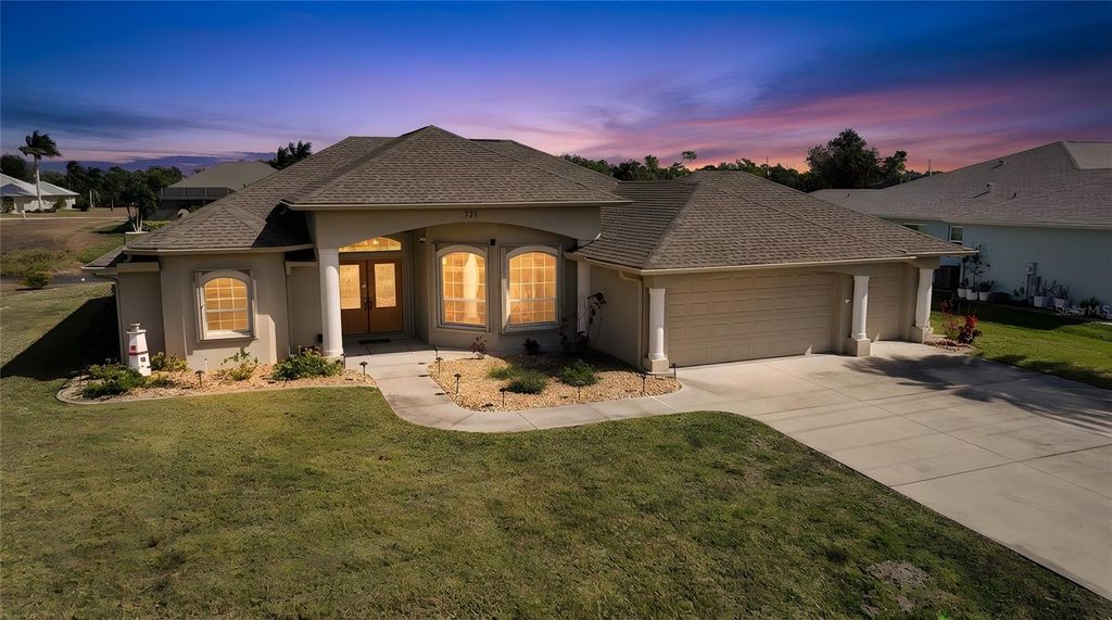 Photo of 721 Rotonda Circle, Rotonda West, FL 33947 (MLS # D6145938)