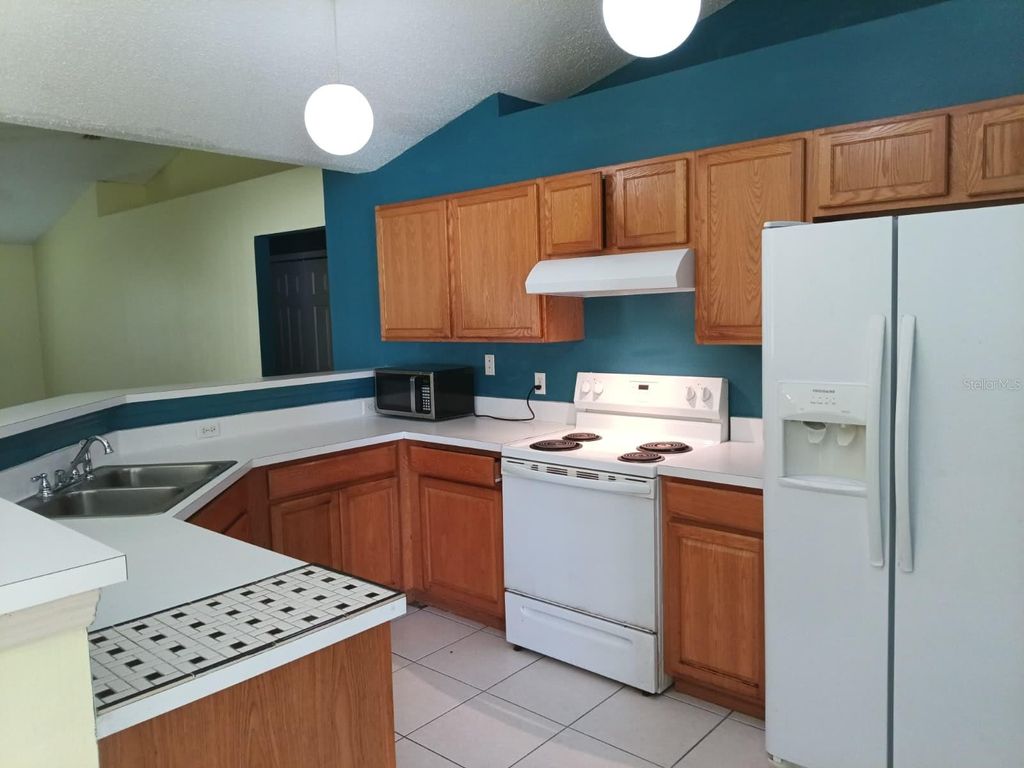 Photo of 433 Flamingo Court, Poinciana, FL 34759 (MLS # S5148357)