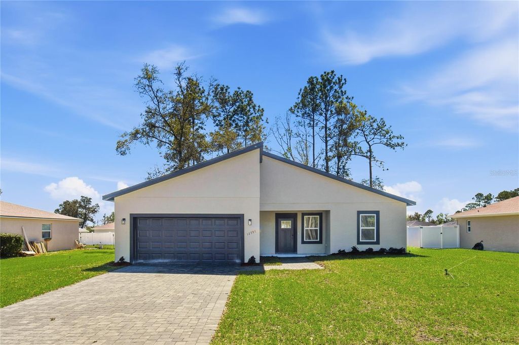 Photo of 12797 SW 58th Circle, Ocala, FL 34473 (MLS # O6390515)