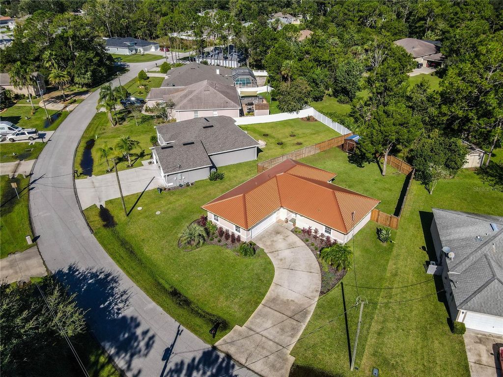 Photo of 50 Whispering Pine Drive, Palm Coast, FL 32164 (MLS # FC313251)