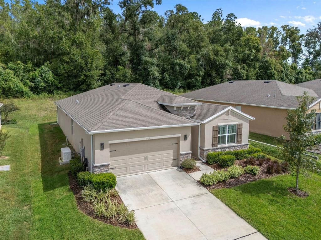 Photo of 12735 Eastpointe Drive, Dade City, FL 33525 (MLS # TB8434592)