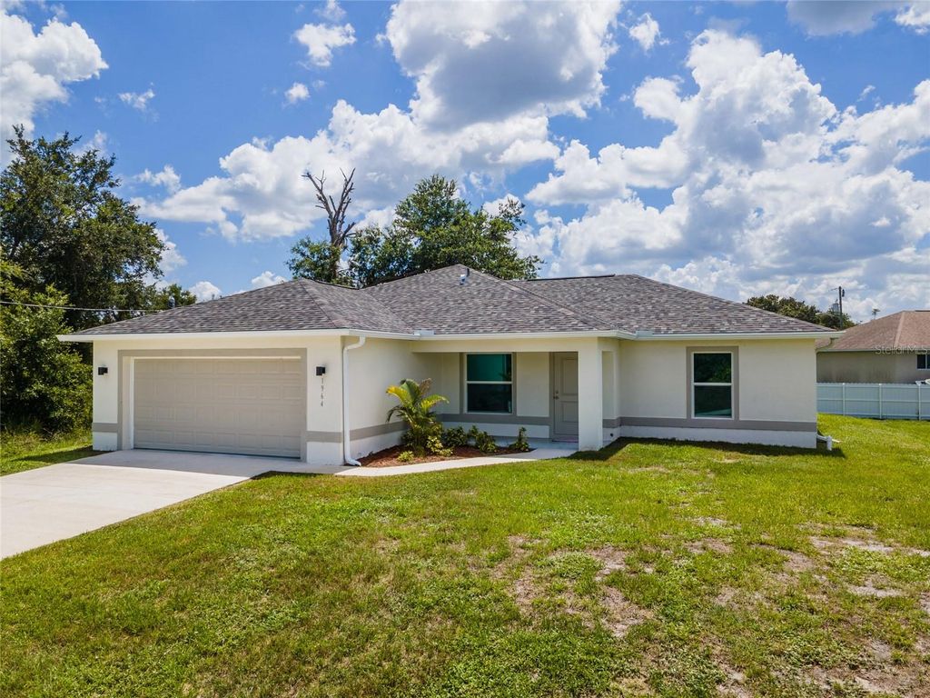 Photo of 1964 Leghorn Street, Lehigh Acres, FL 33972 (MLS # A4698299)