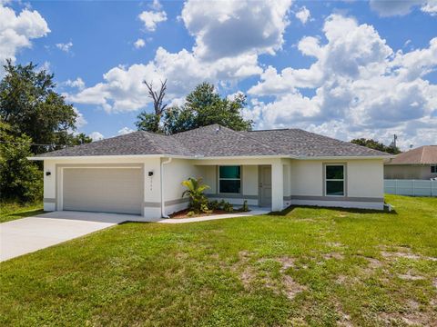 Photo of 1964 Leghorn Street, Lehigh Acres, FL 33972 (MLS # A4698299)