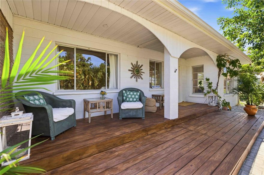 Less than a mile stroll from Nokomis Beach! This inviting coastal retreat embodies the essence of RELAXED Florida living, featuring a warm, beach-inspired design and thoughtfully curated indoor and outdoor spaces on just shy of 1/2 acre. Offering exceptional versatility, the property is well-suited as an iINVESTMENT RENTAL, a seasonal or full-time PRIVATE RESIDENCE, or a prime opportunity to BUILD YOUR OWN CUSTOM COASTAL DREAM HOME in a highly desirable location.

A cozy home with laid-back charm, featuring exposed rafters, whitewashed hardwood flooring, and a sunny west-facing sunroom with classic terrazzo floors—perfect for enjoying golden sunsets.

The open kitchen is both stylish and functional, showcasing modern open shelving, cement countertops, and abundant natural light streaming in from a skylight above. A cozy sitting area just off the kitchen allows the chef to stay connected with their guests. Entertain with ease in the tucked-away dry bar, offering a subtle speakeasy feel that adds character and conversation to gatherings. The home offers three bedrooms and two baths, along with a spacious dining area that can comfortably accommodate up to twelve or more!

Outdoor living is where this property truly shines. Set on just under half an acre and fully fenced for privacy, the grounds offer multiple spaces to relax and entertain—from expansive shaded and sun-drenched decking to a tiki hut with a hammock lounge, a bocce ball court, and a front yard that could easily accommodate a custom pool. Take in breathtaking sunsets from the deck, where you can also enjoy a charming peek-a-boo view of the Intracoastal Waterway. An additional covered porch at the main entrance adds yet another inviting space to enjoy the coastal breezes.

Bonus features include an oversized two-car garage, complete with a separate laundry and storage area, as well as an attached workroom—ideal for hobbies or additional utility space. A double-gate fence provides convenient access to the backyard, offering ample room for a boat, watercraft, or RV along with a storage shed. 

With its generous lot size and prime location near the Gulf, the property also presents an ideal setting to BUILD YOUR CUSTOM DREAM HOME. A rare blend of charm, lifestyle, and future potential—this IS coastal living at its finest!