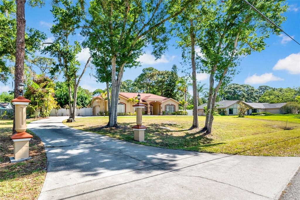 Photo of 6341 Governors Drive, New Port Richey, FL 34655 (MLS # TB8510387)