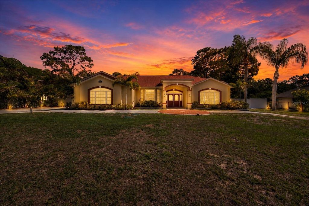 Photo of 6341 Governors Drive, New Port Richey, FL 34655 (MLS # TB8510387)