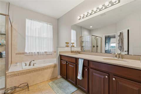 Tiny photo for 718 Barefoot Bay Loop, Groveland, FL 34736 (MLS # G5113497)