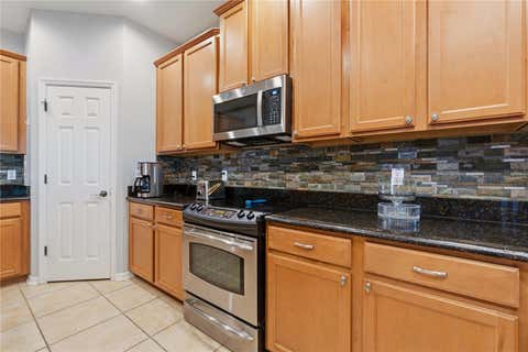 Tiny photo for 718 Barefoot Bay Loop, Groveland, FL 34736 (MLS # G5113497)