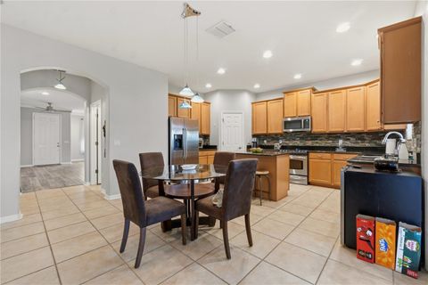 Tiny photo for 718 Barefoot Bay Loop, Groveland, FL 34736 (MLS # G5113497)
