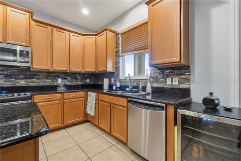 Tiny photo for 718 Barefoot Bay Loop, Groveland, FL 34736 (MLS # G5113497)