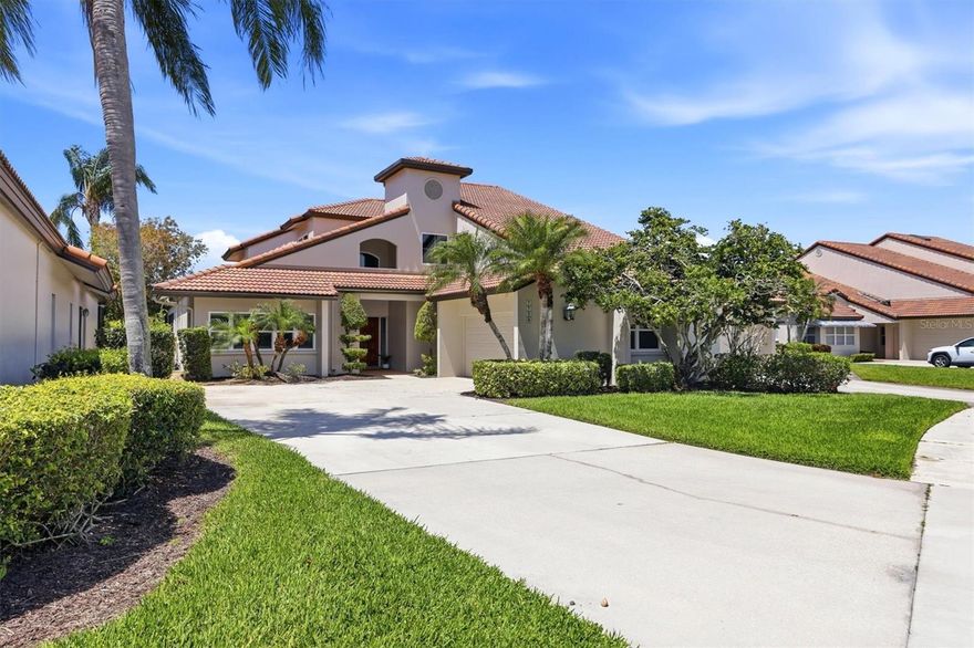 Experience effortless Florida living in this beautifully La Vista villa style 2-story home, ideally located in one of Prestancia’ s most desirable maintenance-free communities—just a short walk to the TPC Clubhouse. Thoughtfully refreshed with new interior and exterior paint, along with brand-new carpeting, the home blends comfort, style, and convenience while offering a fresh, modern canvas for today’s buyer to make it their own and unlock its full potential. Light-filled interiors feature soaring vaulted ceilings and expansive windows, creating an open, airy feel that lives both comfortably and elegantly. The spacious living area flows seamlessly outdoors through pocketing sliding glass doors, opening to a covered, screened lanai—perfect for entertaining or simply enjoying indoor-outdoor living year-round. The kitchen is designed for both function and gathering, with a large center island, ample counter space, wall oven and microwave with warming drawer, dual sinks, and a bright breakfast nook. A formal dining room provides the perfect setting for hosting. The primary suite is a private retreat with direct lanai access, plantation shutters, a generous closet, and a well laid out bath with dual vanities, soaking tub, and separate shower. A guest suite with en-suite bath, powder room, and laundry room complete the main level. Upstairs, two additional bedrooms and a full bath offer flexible space for guests, family, or a home office. Enjoy peace of mind with hurricane-impact glass throughout. Outdoors, the lanai serves as your personal oasis, featuring covered and open seating areas, a solar-heated pool, and tranquil views of the preserve, water, and the 18th fairway of TPC Prestancia. Prestancia residents benefit from 24-hour guard-gated security, beautifully maintained grounds, and optional membership to TPC Prestancia Golf Club, offering two championship courses and an active social lifestyle. Conveniently located near Siesta Key’s renowned beaches, The Legacy Trail, and Sarasota’s top dining, shopping, and cultural attractions. A perfect blend of lifestyle, location, and low-maintenance living—this is the Florida home you’ve been waiting for.