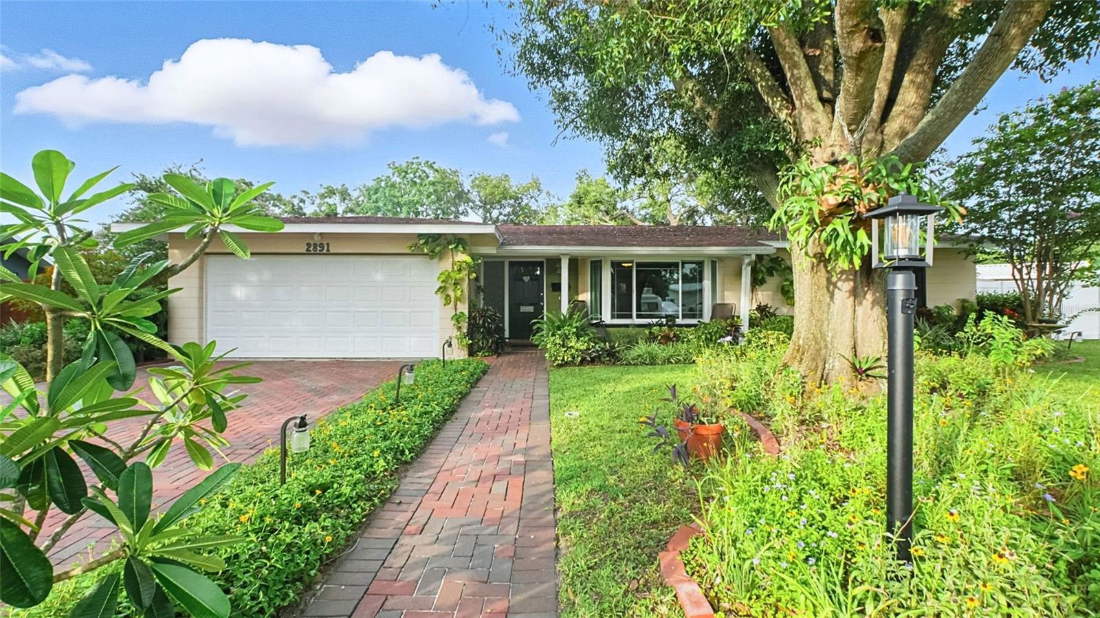 Welcome to your own private retreat in sunny St. Petersburg! This charming home boasts a beautifully landscaped backyard filled with native plants and colorful flowers, creating a serene and eco-friendly paradise. Enjoy fresh produce from your aquaponic garden, relax under the spacious covered patio with beautiful Cuban tile, and pick fruit from your dwarf mango tree—all within your fully fenced outdoor haven.
A 17-ft gravel parking pad provides extra space for your boat or camper, while the brick driveway adds classic curb appeal and durability.
Inside, this 3 bedroom, 2 bathroom and 2 car garage home offers inviting living spaces complete with fresh paint, a new primary shower, newer countertops, new interior doors and hurricane windows! This home also did not incur any water intrusion during the 2024 hurricanes.
Nestled between downtown St. Pete and the award-winning Gulf beaches, you’ll have quick access to everything the city has to offer. Just around the corner, the JW Cate Recreation Center offers tennis, pickleball, baseball, volleyball, a swimming pool, indoor gym, and a variety of events and classes for all ages. And don't forget the neighborhood golf cart parade twice a year with over 100 golf carts participating in the festivities!
This is more than a home—it’s a lifestyle. Whether you’re looking to unwind in nature, grow your own food, or stay active in the community, this unique property has it all.
Schedule your private showing today and experience the best of Florida living!