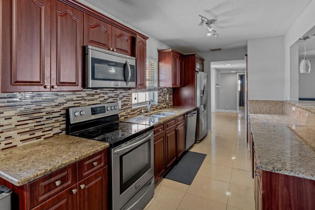 Photo of 6023 Eldorado Drive, Tampa, FL 33615 (MLS # O6397897)