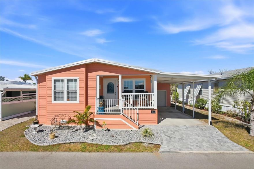 Gorgeous, nearly new 3 Bedroom, 2 Bath Home in the highly desired Harbor View On The Bay! This Gated, 55+, Active Community is located right on the Harbor. Resort style amenities include a Heated Saltwater Pool, Pickleball Courts, Dog Park, Fishing Pier, Putt-Putt, Tiki Huts & Fire Pit to enjoy the Sunsets! Brand-New Clubhouse, and Fitness Center. The Home features a spacious Kitchen with Stainless Steel Appliances, and a large Center Island perfect for entertaining. The open concept  Living and Dining areas are filled with natural light, and details such as Crown Moulding add to the style. The generous Primary Suite offers a walk-in-closet, En-Suite with a Private Bath, Glass Shower Doors, Double Sink Vanity, while two additional Bedrooms provide flexibility for Guests or a Home Office. Inside Laundry Room, Covered Carport, and a Golf Cart Garage for extra Storage, bonus! Front Porch and the Backyard Deck are maintenance free Composite. Come see why so many enjoy this Carefree - Maintenance Free Lifestyle. Just minutes from Downtown Punta Gorda. Don't miss this one!