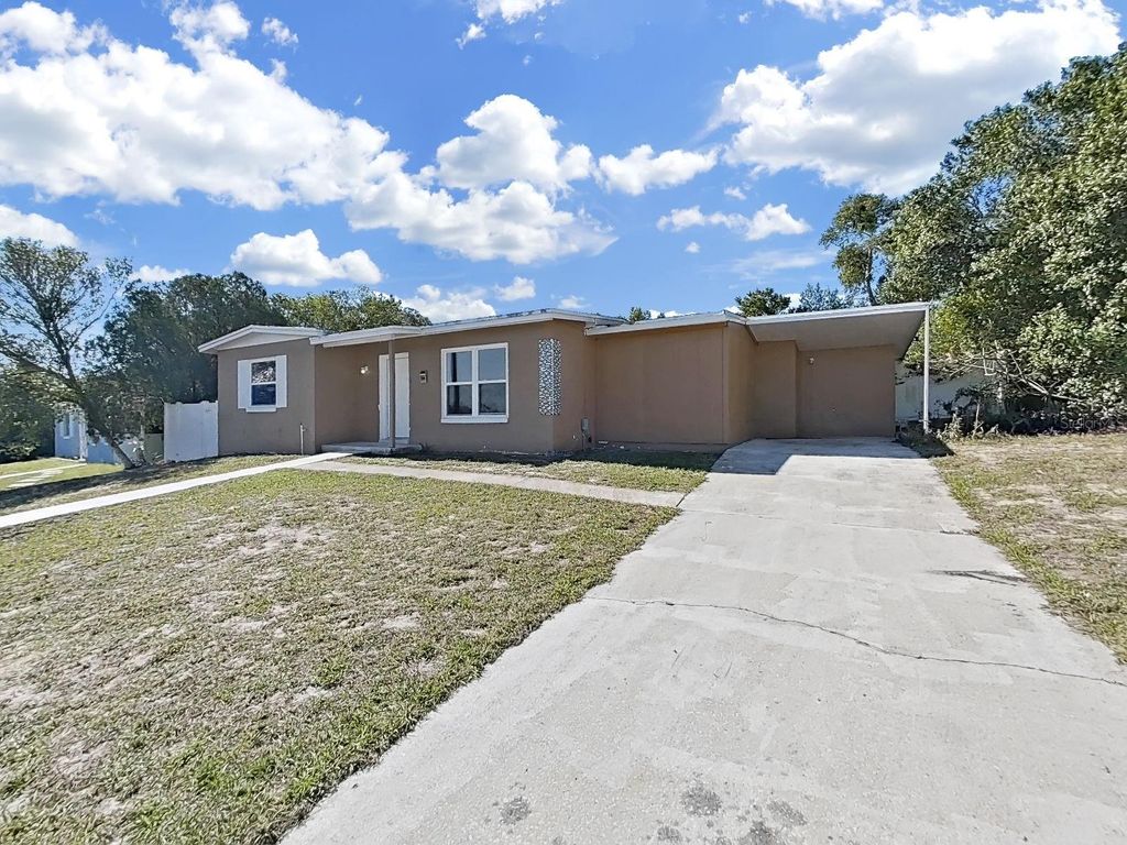 Photo of 7098 Holiday Drive, Spring Hill, FL 34606 (MLS # TB8491592)