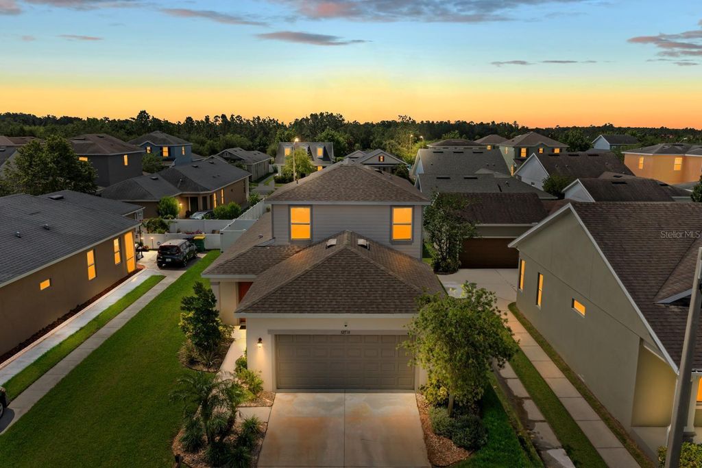 Photo of 32718 Harmony Oaks Drive, Wesley Chapel, FL 33545 (MLS # TB8389166)